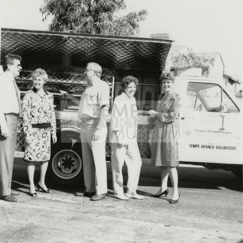 Group Stands in Front of American Red Cross Truck