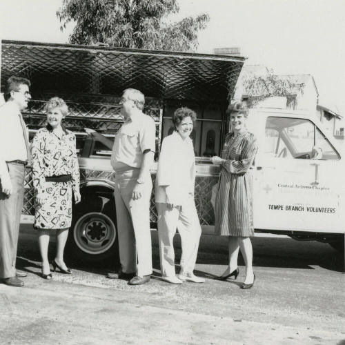 Group Stands in Front of American Red Cross Truck