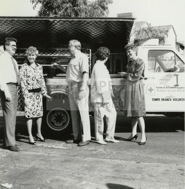 Group Stands in Front of American Red Cross Truck