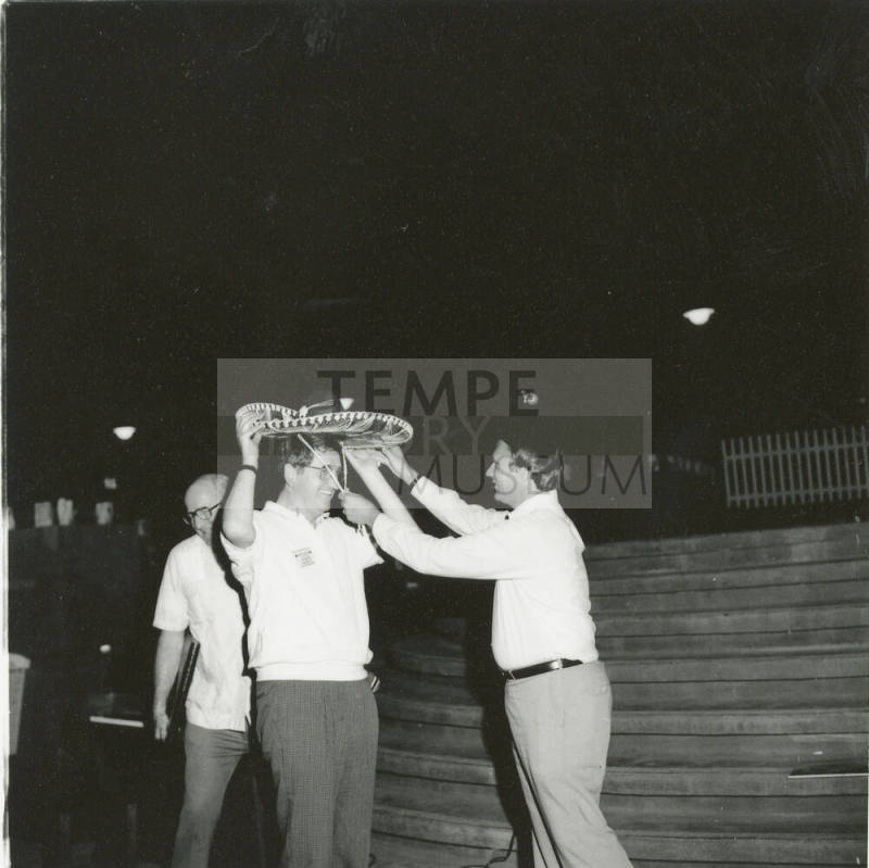 Three unidentified men