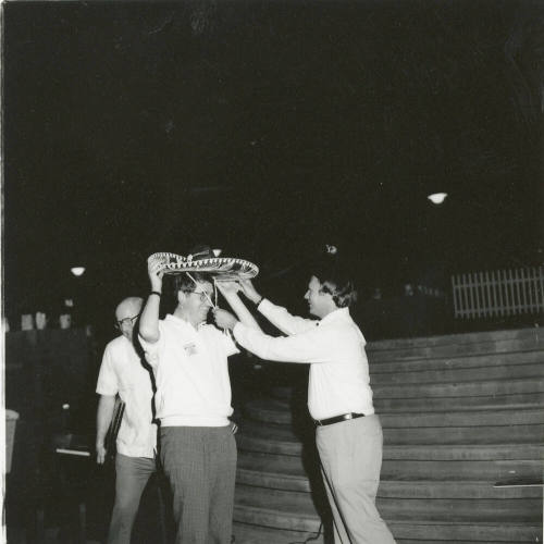 Three unidentified men