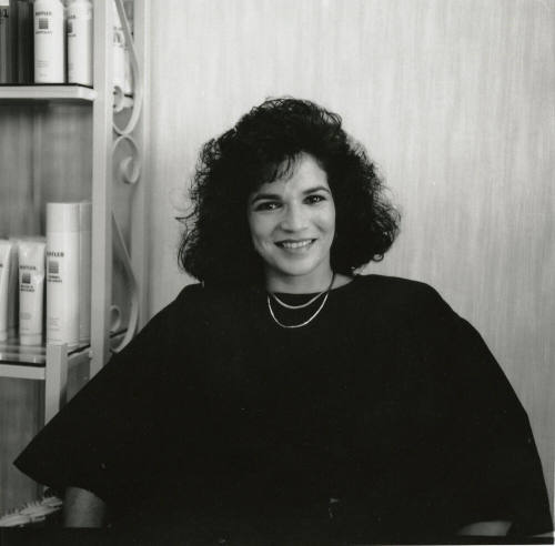 Unidentified woman posing for the camera at a salon