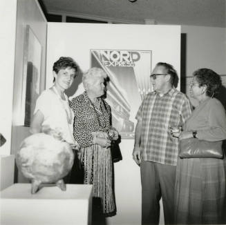 Group at Tempe Collects art show