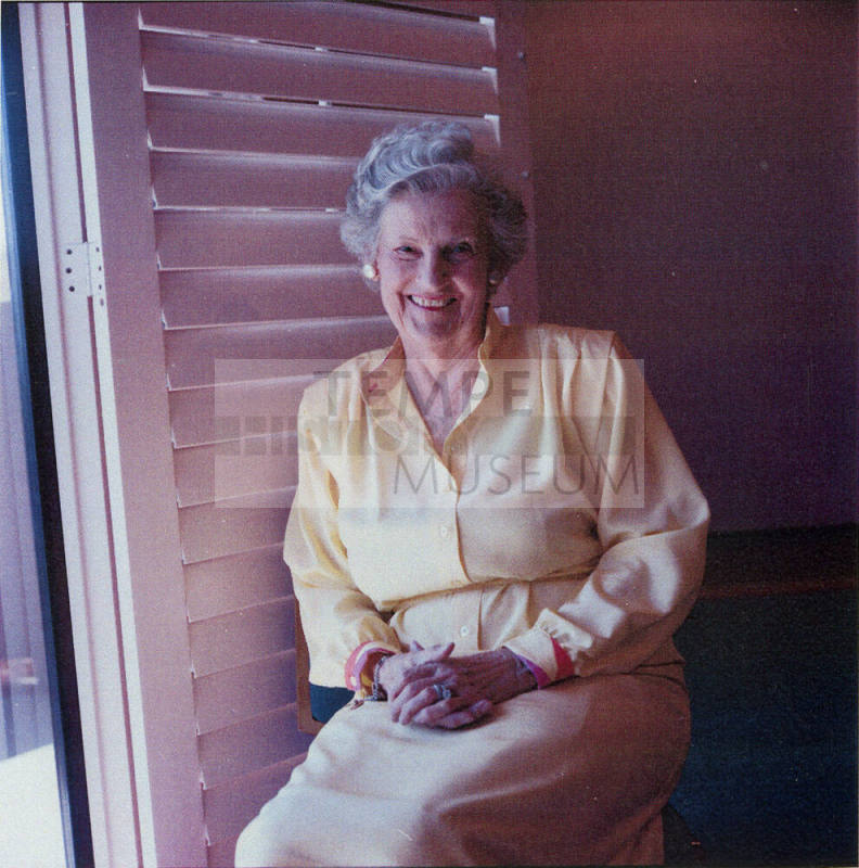 Woman posing for the camera.