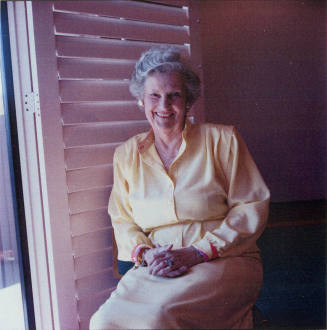 Woman posing for the camera.