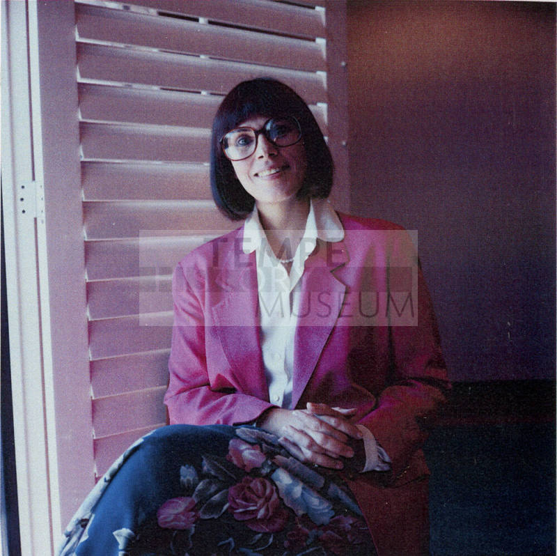 Woman posing for the camera.