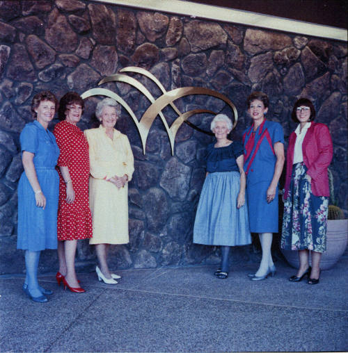 Group of women standing for a photoshoot. - October 5 1987