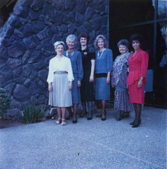Group of women standing for a photoshoot. - October 5 1987