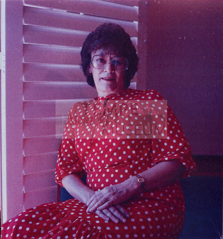 Woman posing for the camera.