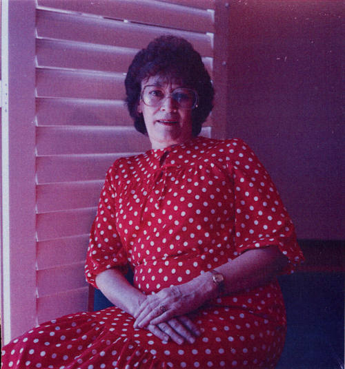 Woman posing for the camera.