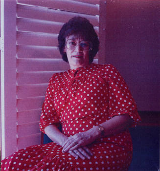 Woman posing for the camera.