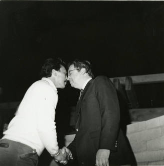 Rangi Luke and Richard Neuheisel rub noses - a Maori greeting