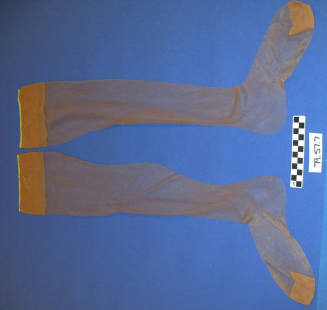 Pair of tan silk stockings