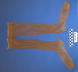 Pair of tan silk stockings