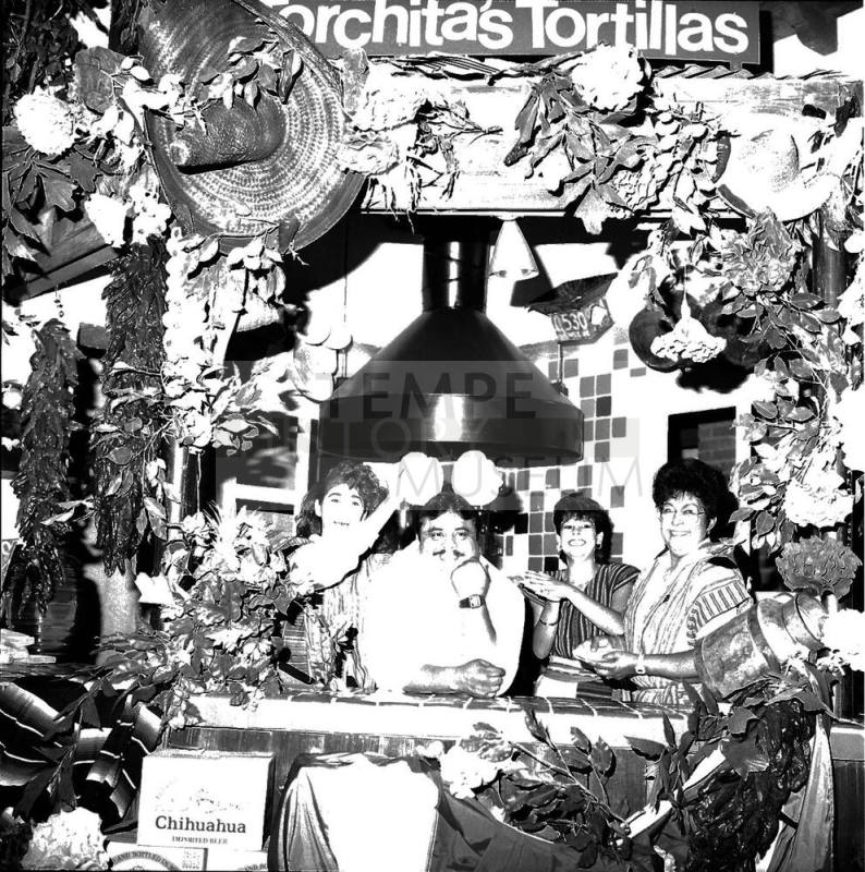 Family behind counter of  Torchita's Tortillas - Tempe's Depot Cantina