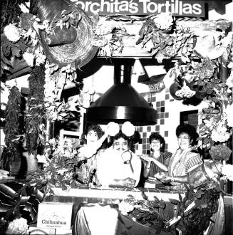 Family behind counter of  Torchita's Tortillas - Tempe's Depot Cantina
