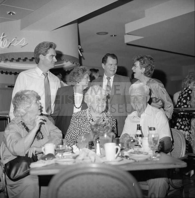 Duck's location opens at Holiday Inn at Rural and Apache. L to R- Peter Gorski, Pat and Roger Hatton, Juanita Harleson, Avery Helm, Virginia Tinsley and Jim Harleson