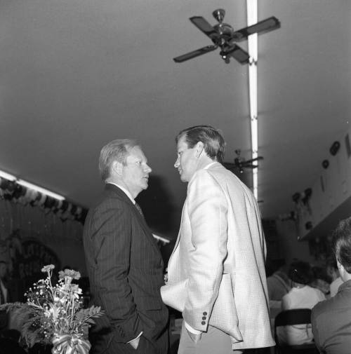 Two Unidentified Men at an Event