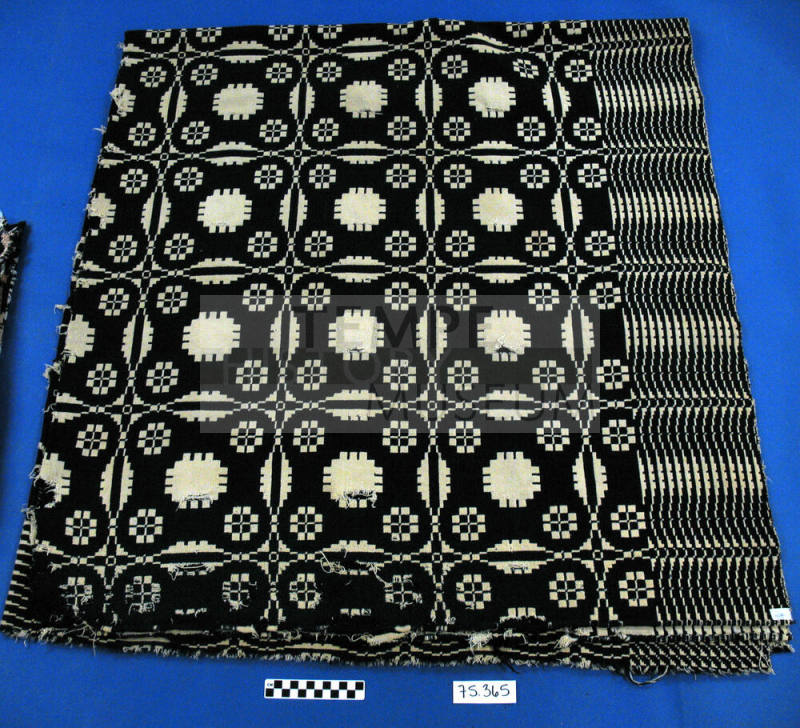 Blue and white wool bedspread