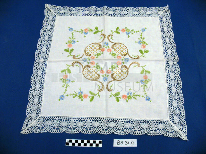 Large white square Doily with Lace around edges and floral design in center