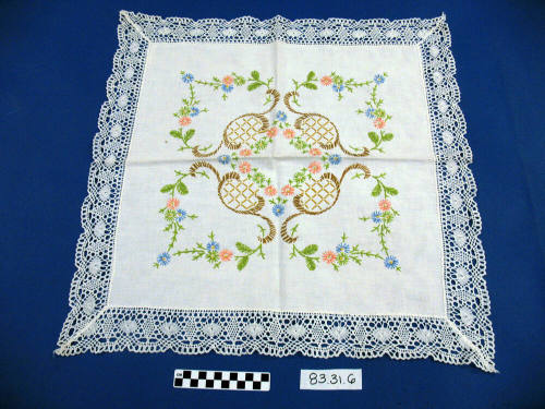 Large white square Doily with Lace around edges and floral design in center