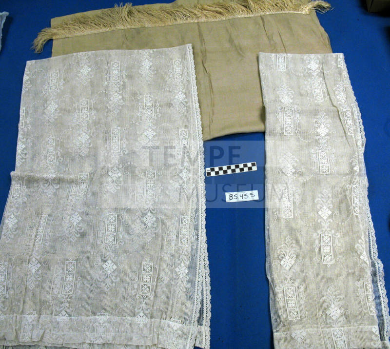 Two white lace blankets and a Tan Flat Sheet with Fringe