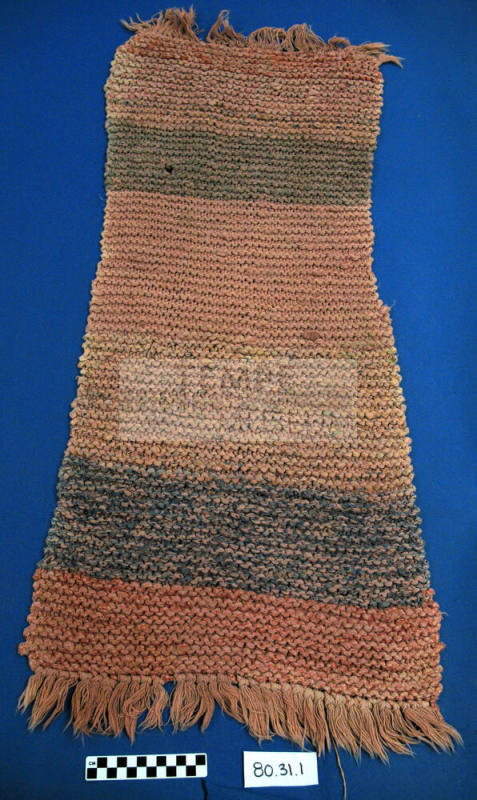 Pink knitted throw rug