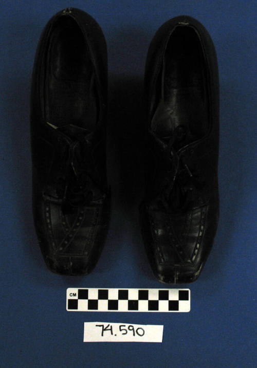 Pair of black ladies' lace-up shoes