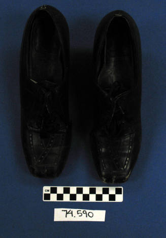Pair of black ladies' lace-up shoes