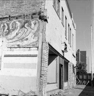 Partially demolished building, 4th Street and Mill Avenue