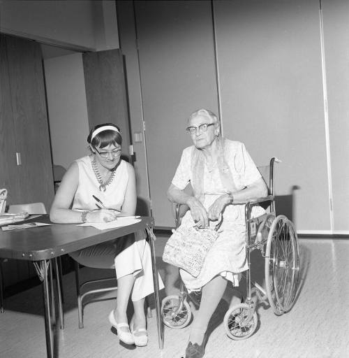 Two women, one in wheelchair