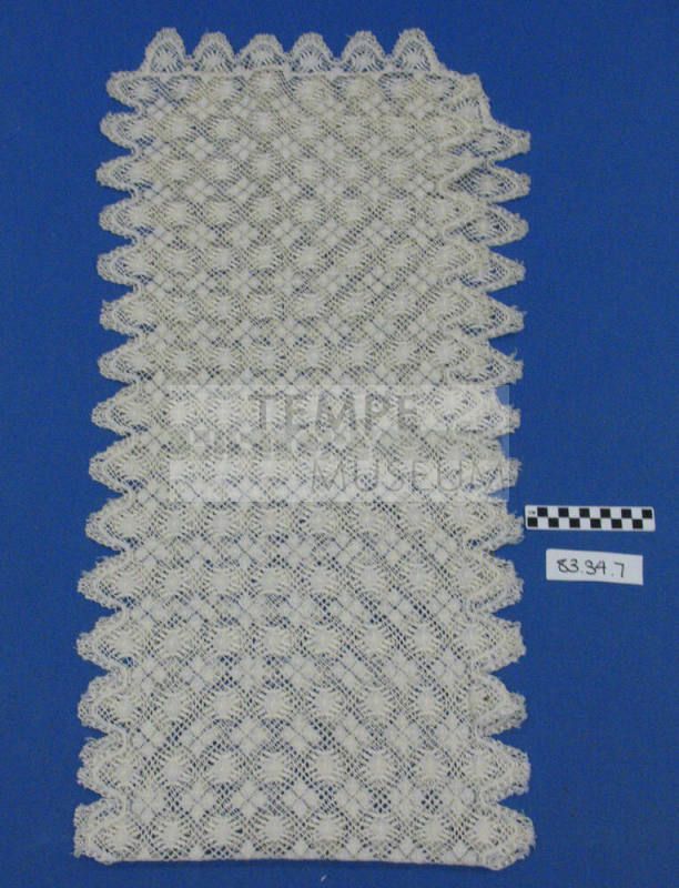 White crocheted pillow sham