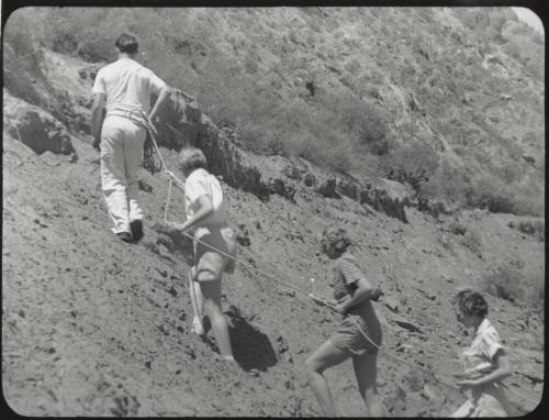 Photograph: group of coeds climbing Tempe Butte