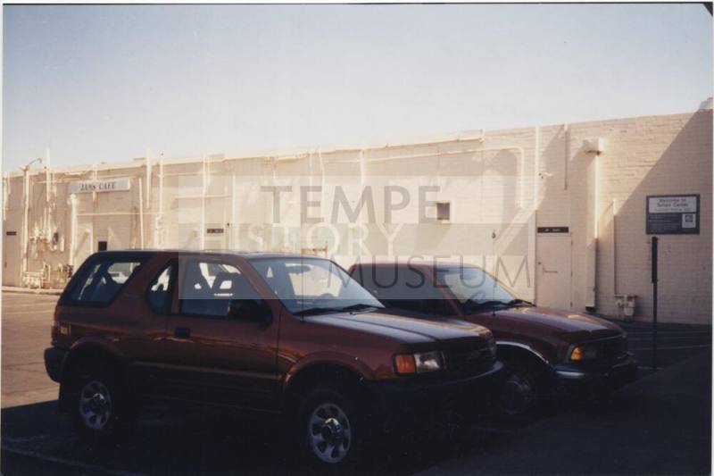 Color print of back of Tempe Center, Jam's Café and Sacks to NW
