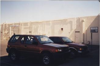Color print of back of Tempe Center, Jam's Café and Sacks to NW