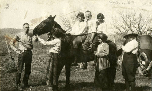 KAYGEE photograph people and a horse