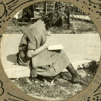 photograph of woman reading