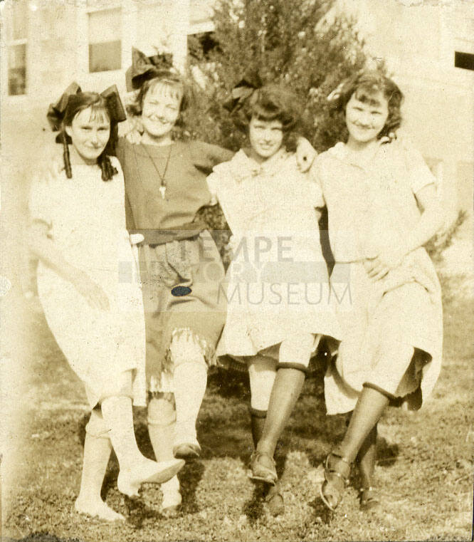 Photograph of four woman