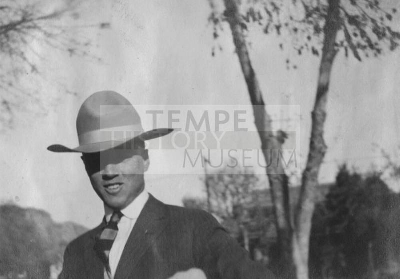 Man smiling wearing a hat