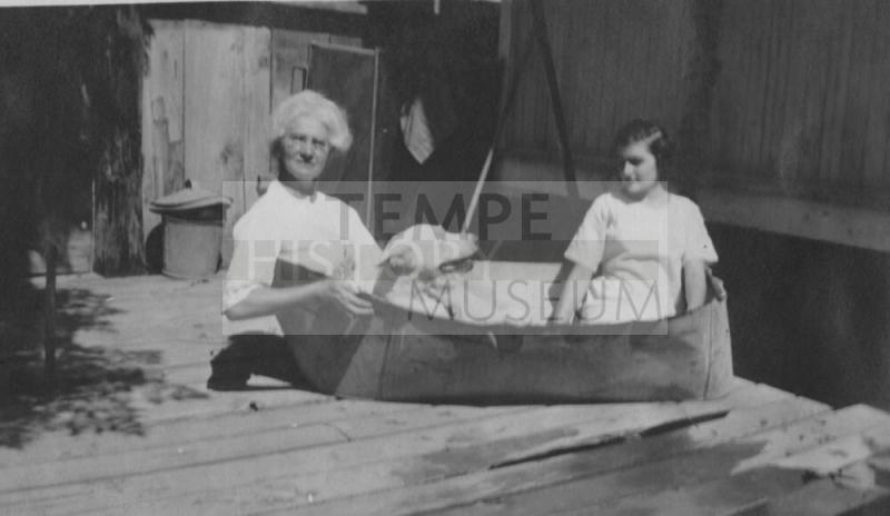 Woman and Velma in a tub