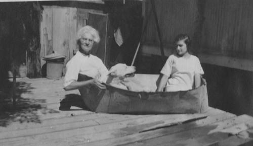 Woman and Velma in a tub