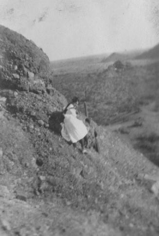 Velma on the side of a hill