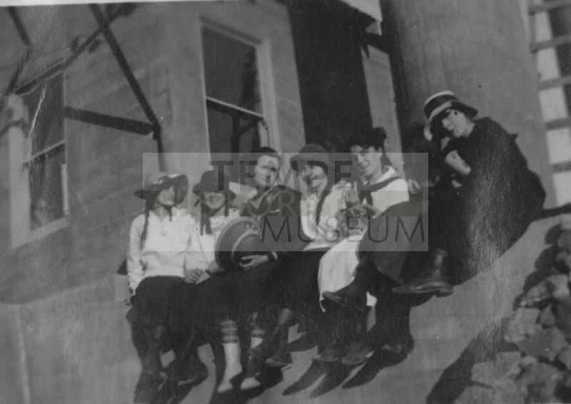 Group sitting on edge
