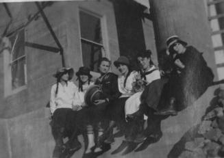 Group sitting on edge