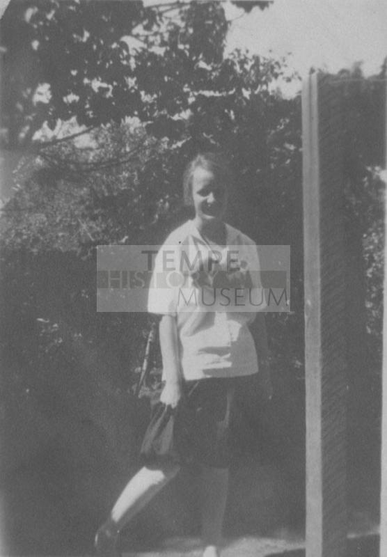 Girl in white standing