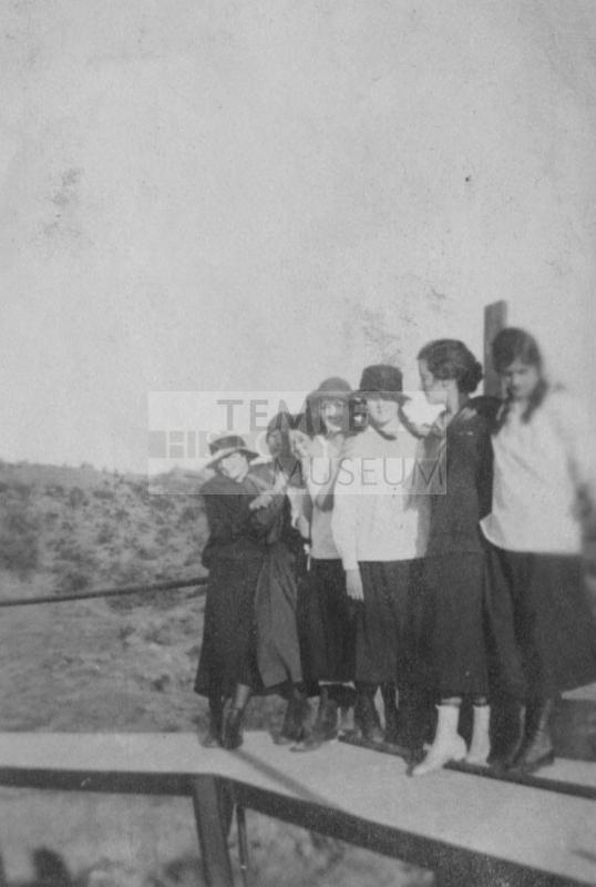 Group stands on platform
