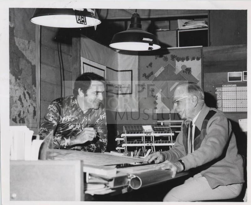 Photograph of Kemper Goodwin and Michael Goodwin at office.