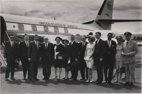 Carl Hayden with group of official looking individuals.