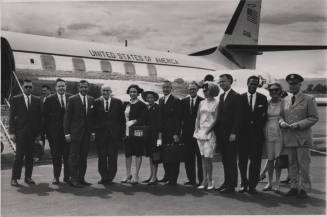 Carl Hayden with group of official looking individuals.