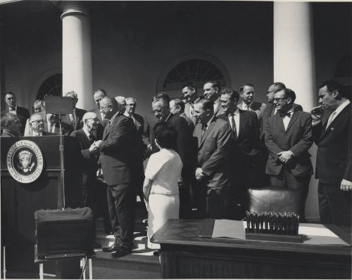 Senator Hayden shaking hands with President Johnson on the White House Porch